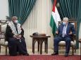 الرئيس محمود عباس يستقبل والدة الأسير ناصر أبو حميد(2).JPG