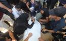 غزة: فلسطينيون يشيعون جثامين عدد من رجال الشرطة الذين قضوا في غارة إسرائيلية استهدفت منطقة التوام شمال قطاع غزة، وذلك داخل مستشفى الشفاء، بتاريخ 23 مايو/أيار 2026.تصوير : بلال أسامة