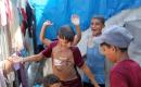 يعيش فلسطينيون نازحون في خيام مؤقتة في استاد اليرموك بمدينة غزة، في 29 يوليو/تموز 2026.صورة: بلال أسامة
