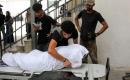 قدّم المشيّعون واجب العزاء الأخير لجثماني فلسطينيين قُتلا في غارة جوية إسرائيلية على مخيم جباليا للاجئين شمال قطاع غزة، وذلك خلال جنازتهما في مستشفى الشفاء بمدينة غزة في 23 يوليو/تموز 2026. صورة: محمد صالحة
