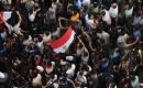 يتابع فلسطينيون البث المباشر لمباراة دور الـ16 من بطولة كأس العالم لكرة القدم بين مصر والأرجنتين في مدينة غزة يوم الثلاثاء 7 يوليو/تموز 2026. (صورة: عمر أشتوي)
