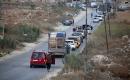 فلسطينيون ينتظرون عند حاجز بيت فوريك العسكري الإسرائيلي شرق نابلس، في الضفة الغربية، في 18 سبتمبر/أيلول 2026. صورة: محمد ناصر