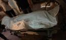 وصول شهيد الى مجمع الشفاء الطبي.jpg