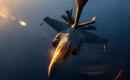 مقاتلة من طراز F-35 خلال تزودها بالوقود أثناء دورية روتينية فوق المياه الإقليمية في الشرق الأوسط. (لقيادة المركزية الاميركية).jpeg