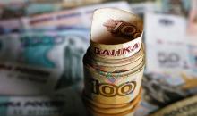 أوراق نقدية من عملة الروبل الروسي. (رويترز).jpeg