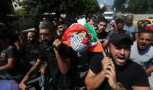 فلسطينيون يشيعون جثمان الشهيد محمد عرايشي الذي استشهد متأثرا بجروحه الخطيرة التي أصيب بها قبل حوالي أسبوعين في نابلس 8.jpg