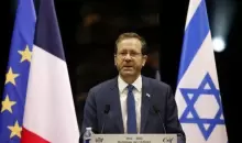 الرئيس الإسرائيلي إسحق هرتزوج في تولوز جنوب فرنسا يوم 20 مارس آذار 2022. صورة لرويترز من ممثل لوكالات الأنباء.