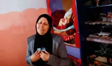 الفلسطينية نجوى أبو حمادة تبكي ابنها الذي قتل في قصف إسرائيلي على قطاع غزة. تصوير: محمد سالم - رويترز