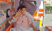 مغادرة الطفلة الجريحة رهف خليل سلمان وأخيها محمد برفقة والديهم بإتجاه تركيا للعلاج جراء اصابتها بحالة بتر في قدميها ويدها اليمنى خلال العدوان الأخير على قطاع غزة.jpg