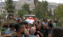 من تشييع ضحية الأحداث المؤسفة في نابلس فراس يعيش .. تصوير (الفرنسية) 1.jpg