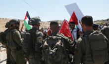 فلسطينيون يشاركون في مسيرة ضد الاستيطان في قرية يطا جنوب مدينة الخليل 14(2).jpg