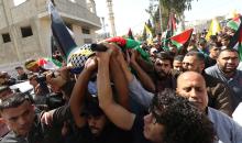 فلسطينيون يشيعون جثمان الشهيد مجاهد داوود 31 عام في قرية حارس غرب مدينة سلفيت بالضفة الغربية 9.jpg