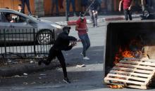 مواجهات بين المتظاهرين الفلسطينيين وقوات الاحتلال الإسرائيلي في الخليل 3ف.jpg