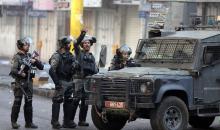 مواجهات بين الشبان وقوات الاحتلال في منطقة باب الزاوية وسط مدينة الخليل.jpg