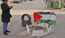 صور لسيارة والمكان الذي استشهدت فيه الشابة سناء الطل في بيتونيا غرب رام الله .. تصوير (الفرنسية) 5.jpg