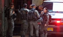 من محيط عملية الطعن بالقدس .. تصوير (الفرنسية) 4.jpg