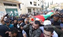 تشييع جثمان الشهيد داوود ريان (42 عاما) الى مثواه الاخير في بيت دقو شمال غرب القدس.jpg