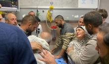 طواقم مجمع فلسطين الطبي خلال محاولتها إنقاذ حياة الشاب مصعب نفل قبل الإعلان عن ارتقائه شهيدا متأثرا بإصابته الحرجة.jpeg