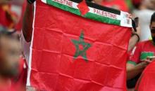 مشجعون يرفعون أعلام فلسطين خلال مباراة المغرب وكندا 4.jpg