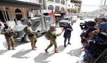 جنود الاحتلال يقمعون مسيرة وسط بلدة حوارة جنوب نابلس في ذكرى يوم الارض. 5.jpg