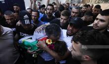 وصول جثمان الشهيد الطفل محمد التميمي (3 سنوات) لمجمع فلسطيني الطبي  7.jpg