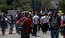 قوات الاحتلال تقمع مسيرة رافضة للاستيطان في قرية أم صفا شمال غرب رام الله.jpg