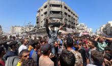 فلسطينيون يحتجون على الجوع وارتفاع الأسعار في ظل الحصار والهجوم الإسرائيلي بغزة (رويترز).jpeg