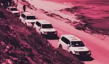 سيارات الامم المتحدة في غزة.webp