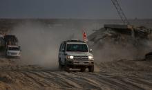 عمليات البحث لاستعادة جثث الرهائن الإسرائيليين، يجريها أعضاء من كتائب القسام، ومسؤولون من اللجنة الدولية للصليب الأحمر في حي الزيتون بقطاع غزة