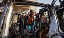 فلسطينيون وفرق الدفاع المدني ينتشلون ضحايا سقطوا في غارات جو (18).jpg