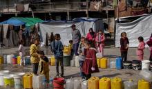 وفد من الأمم المتحدة يتفقد حوض تجميع مياه الصرف الصحي في حي الشيخ رضوان بمدينة غزة (22).jpg