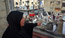 فرق الدفاع المدني تبدأ عمليات البحث عن 55 جثة تحت أنقاض 13 منزلاً دمرها القصف الإسرائيلي في خان يونس، 20 ديسمبر/كانون الأول 2025. صور: طارق محمد/ (APA )