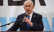 رئيس الوزراء الإٍسرائيلي بنيامين نتنياهو يتحدث خلال مشاركته في جنازة الأسير الإسرائيلي ران غويلي.jpg