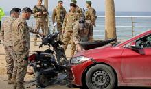 بيروت 12 مارس 2026 (شينخوا) في الصورة الملتقطة يوم 12 مارس 2026، جنود الجيش اللبناني يتفقدون موقعا استهدفته غارة جوية إسرائيلية على منطقة الرملة البيضاء في بيروت في لبنان. ....JPG