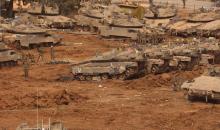 القدس 14 مارس 2026 (شينخوا) في الصورة الملتقطة  13 مارس 2026، قوات إسرائيلية تتمركز في منطقة تجمع شمالي إسرائيل بالقرب من الحدود مع لبنان..JPG