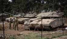 القدس 14 مارس 2026 (شينخوا) في الصورة الملتقطة يوم 13 مارس 2026، قوات إسرائيلية تتمركز في منطقة تجمع شمالي إسرائيل بالقرب من الحدود مع لبنان..JPG