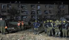 موقع ضربة صاروخية إيرانية في ديمونا في 21 آذار 2026.(أ ف ب).jpeg