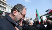 طهران 11 مارس 2026 (شينخوا) في الصورة الملتقطة يوم 11 مارس 2026، رجل يحضر جنازة لكبار القادة العسكريين الإيرانيين، الذين قتلوا خلال الضربات التي شنتها الولايات المتحدة وإسرائيل ضد إيران، في العاصمة الإيرانية طهران..JPG