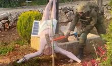 الجيش الإٍسرائيلي يقر بتحطيم أحد جنوده تمثالا للمسيح ببلدة جنوبي لبنان.jpg