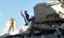 امرأة لبنانية على ركام منزل (Getty Images).jpg