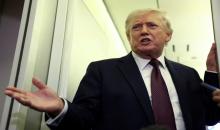 الرئيس الأميركي دونالد ترامب على متن طائرة الرئاسة إير فورس ون  في رحلة العودة إلى واشنطن في 15 آذار 2026. (رويترز).jpeg