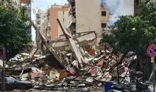 أطلال المبنى الذي يضم مخازن  المركز الثقافي للكتاب  في الضاحية الجنوبية من بيروت (الجزيرة).webp