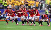 فرحة هستيرية من لاعبي المنتخب المصري فور التأهل التاريخيّ (Getty Images).jpg