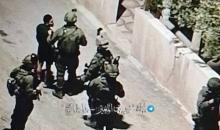 قوات الاحتلال تعتقل أحد الشبان خلال اقتحام قرية دير جرير، شرق رام الله..jpg