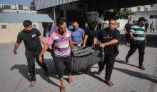 فلسطينيون يودّعون جثمان الشهيد محمد عبد الخالق خلة في مستشفى الشفاء بمدينة غزة، الخميس 15 أكتوبر/تشرين الأول 2026.تصوير: محمد صالحة