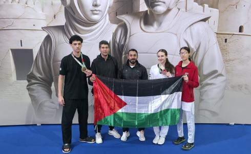 فرج الله يضيف ذهبية ثانية لفلسطين في بطولة كأس العرب للتايكواندو.jpg