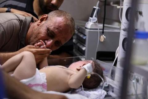 محمد الحديدي المكلوم بزوجته وأطفاله الأربعة