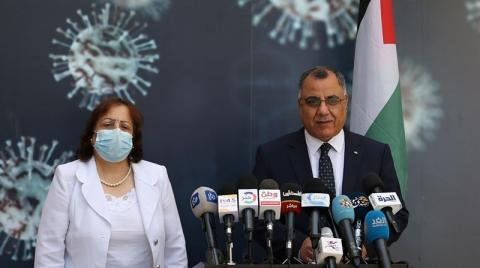 الناطق باسم الحكومة ابراهيم ملحم، ووزيرة الصحة مي الكيلة