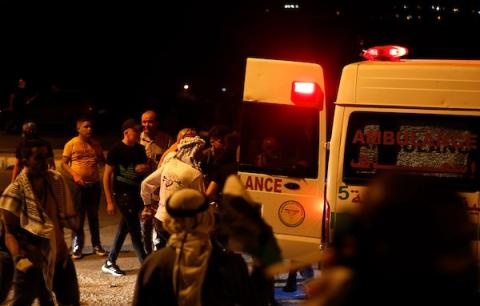 مواجهات بين المتظاهرين الفلسطينيين وقوات الجيش الإسرائيلي عقب مسيرة تضامنا مع الأسرى عند حاجز حوارة بنابلس