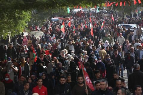  أنصار الجبهة الشعبية لتحرير فلسطين يشاركون في مسيرة بمناسبة الذكرى 54 لتأسيسها في مدينة غزة